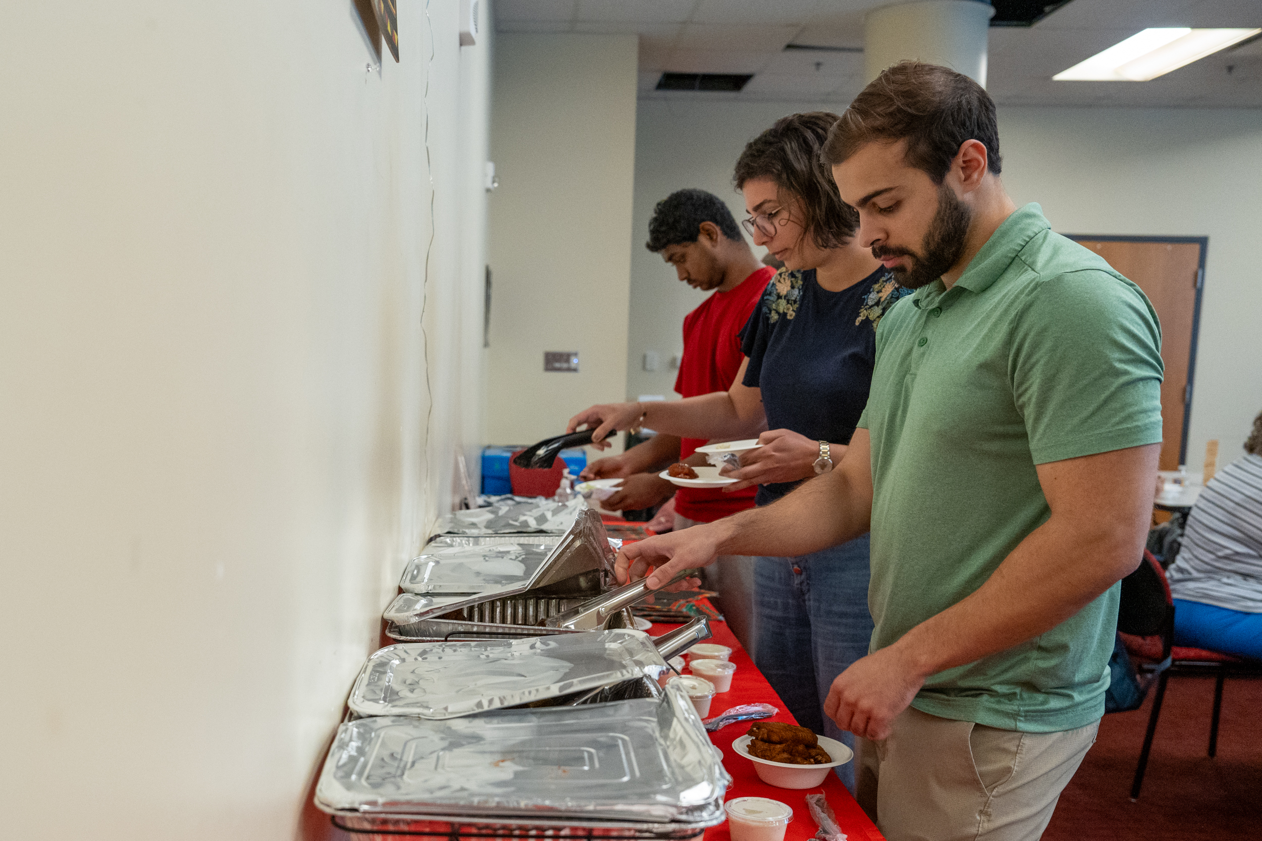 People eating catered food