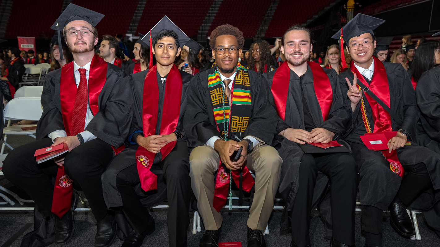 A group of male Bachelor's degree candidates at the Xfinity Center just before the ceremony.