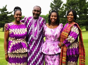 Louisa's family in 2018 dressed in Ghanian outfits for her sister's engagement ceremony.