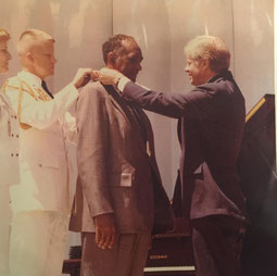 Uncle Clarence receiving the Presidential Medal of Freedom.