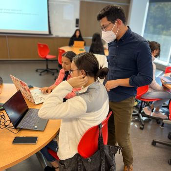 Elias Gonzalez teaching students in the classroom