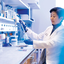 Kan Cao working in the lab